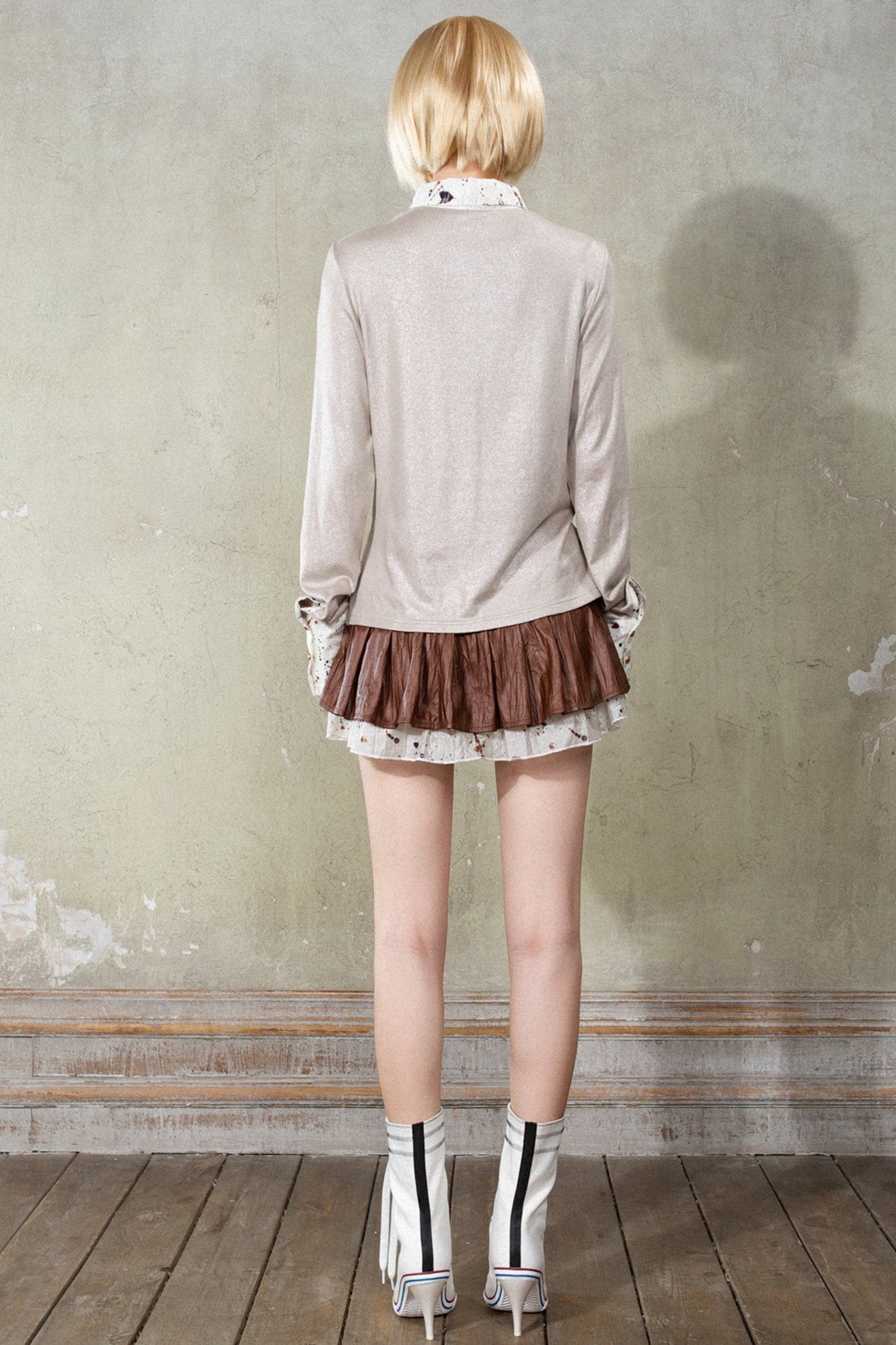 Cardigan du bouton de drapé de perle