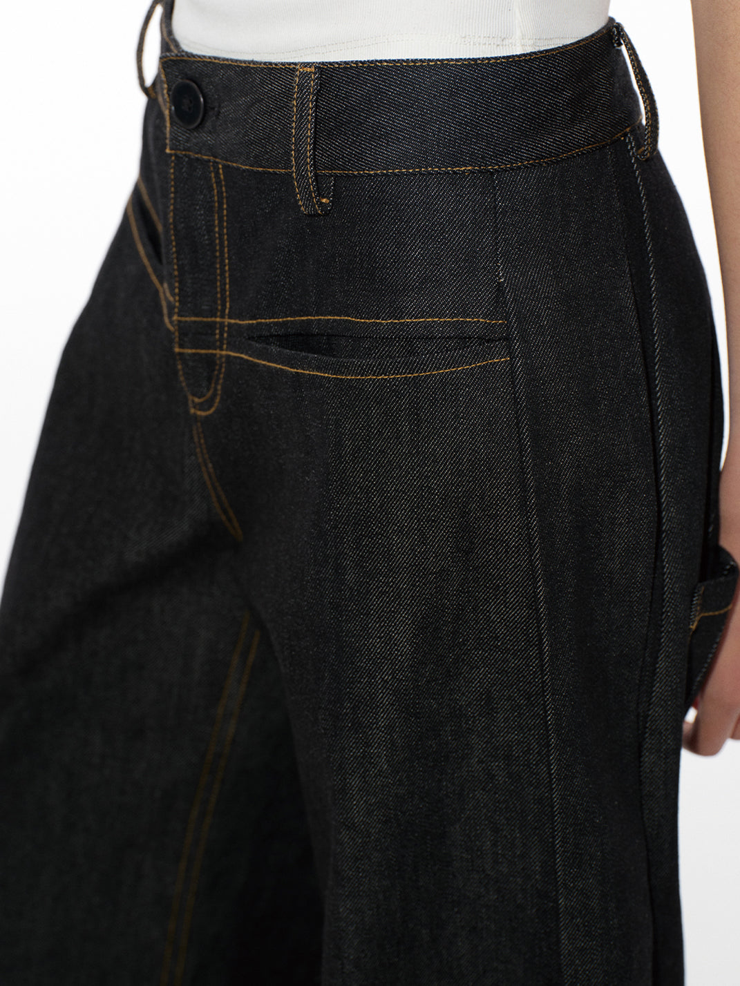 Low-Rise Curved Raw Denim Jeans