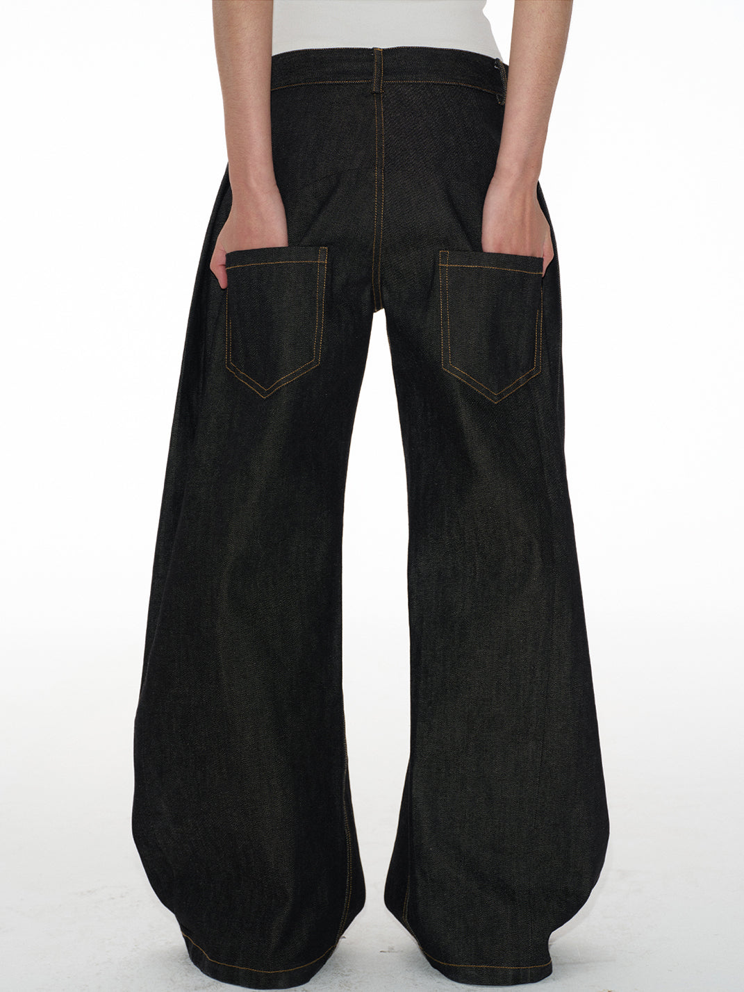 Low-Rise Curved Raw Denim Jeans