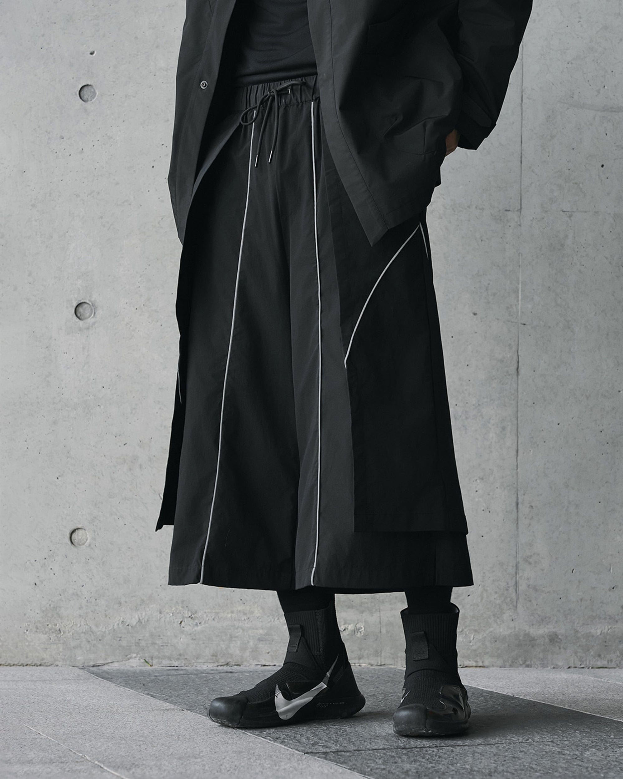 Pantalon de piste en couches larges