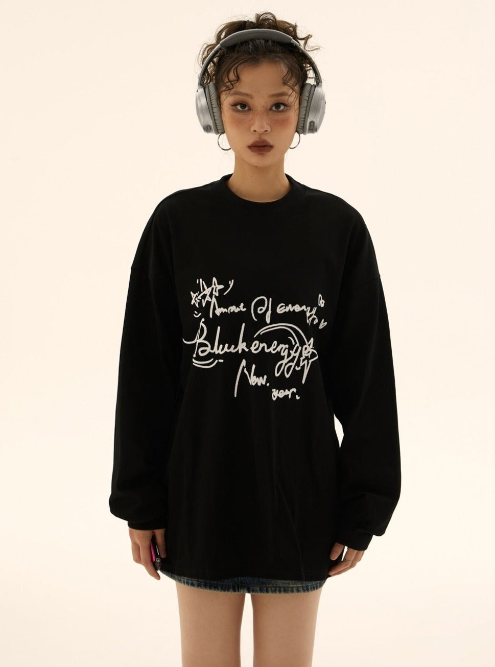 Suéter de guión de garabatos