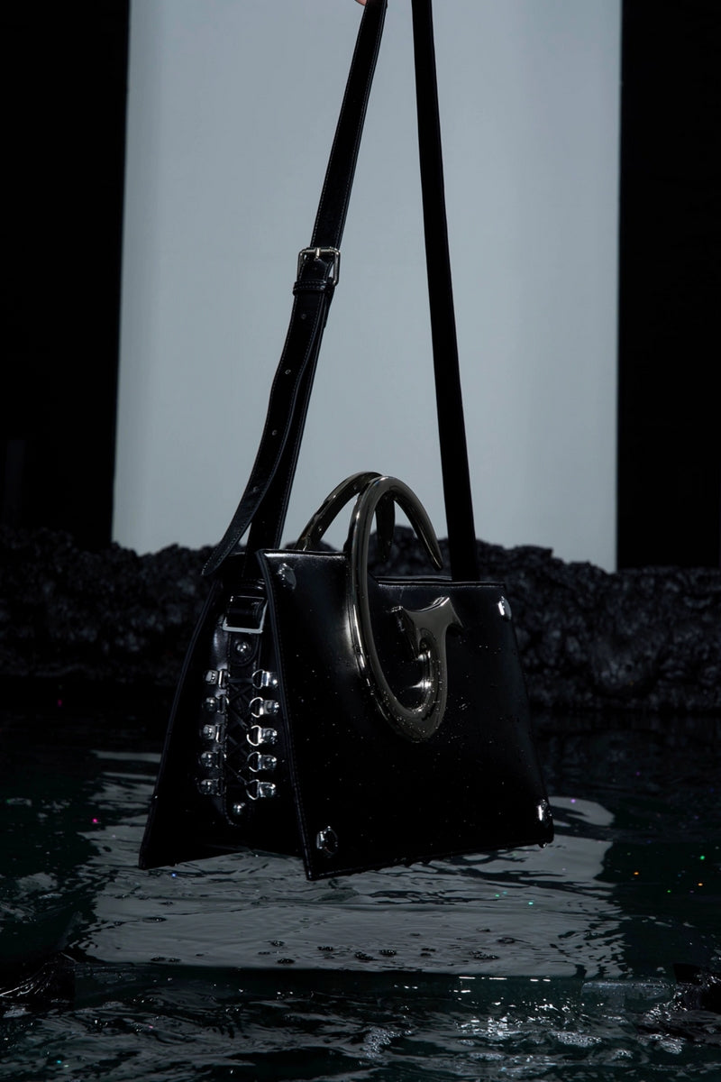 Avant-Garde Metal Handle Shoulder Bag - Sleek Black Designer Tote