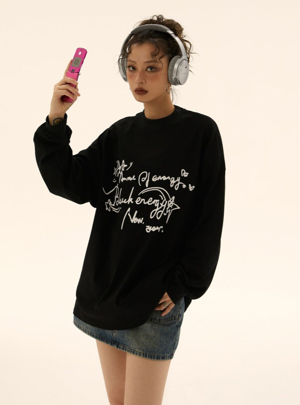 Suéter de guión de garabatos