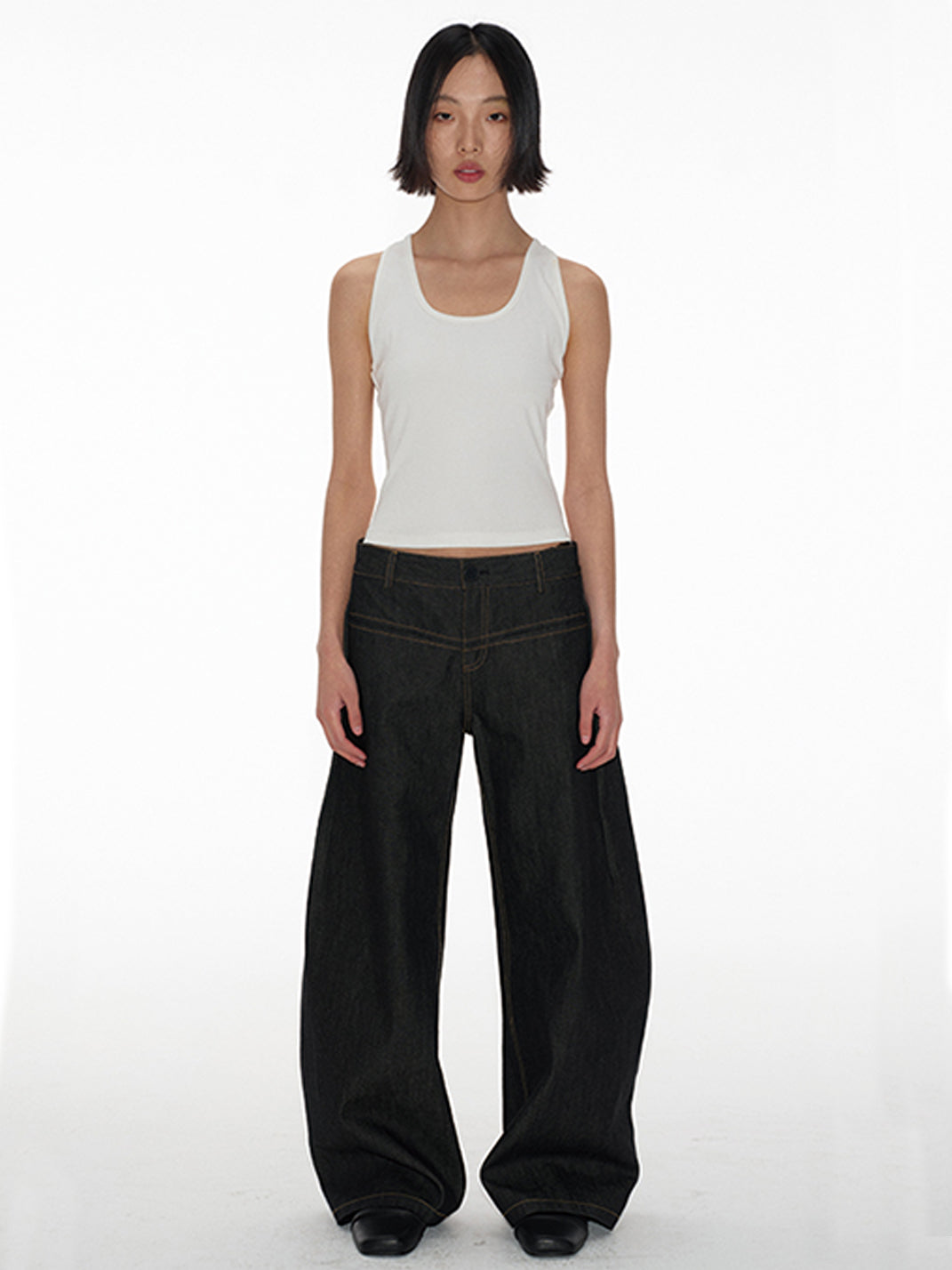 Low-Rise Curved Raw Denim Jeans