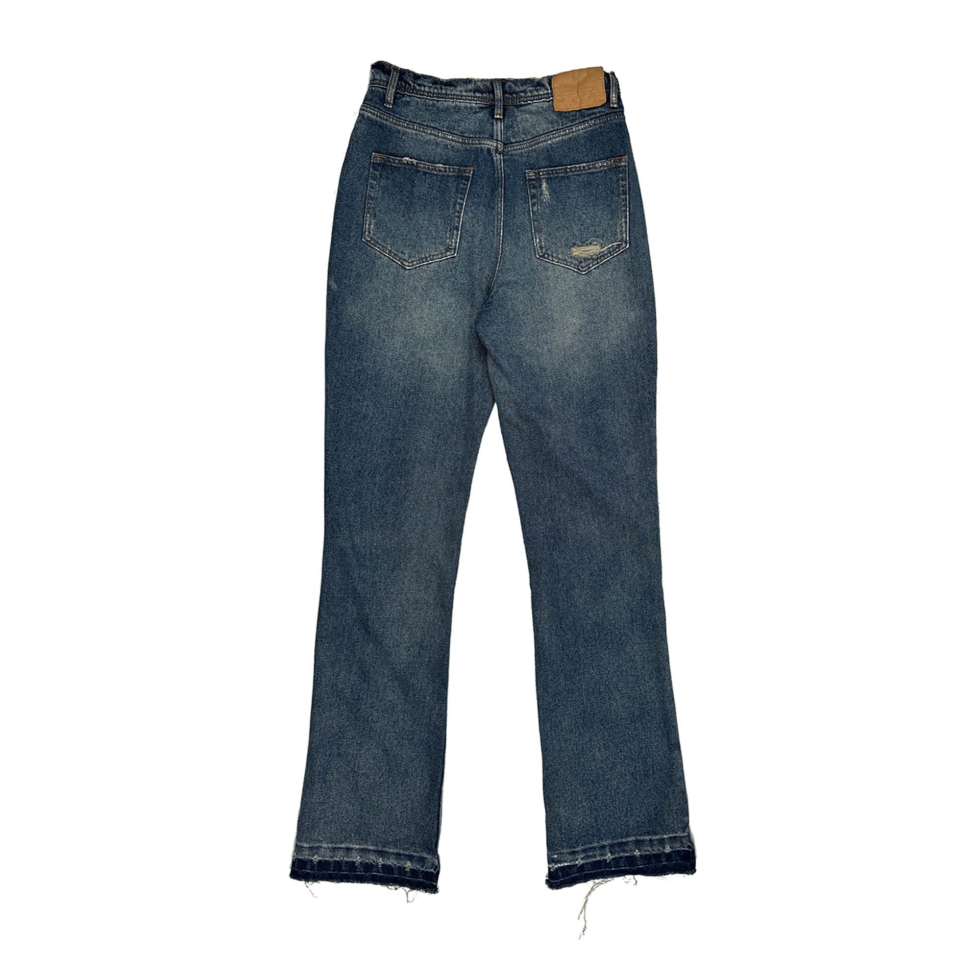 Jeans de brote de salpicadura de pintura angustiada