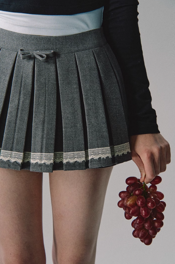 Jupe plissée en dentelle