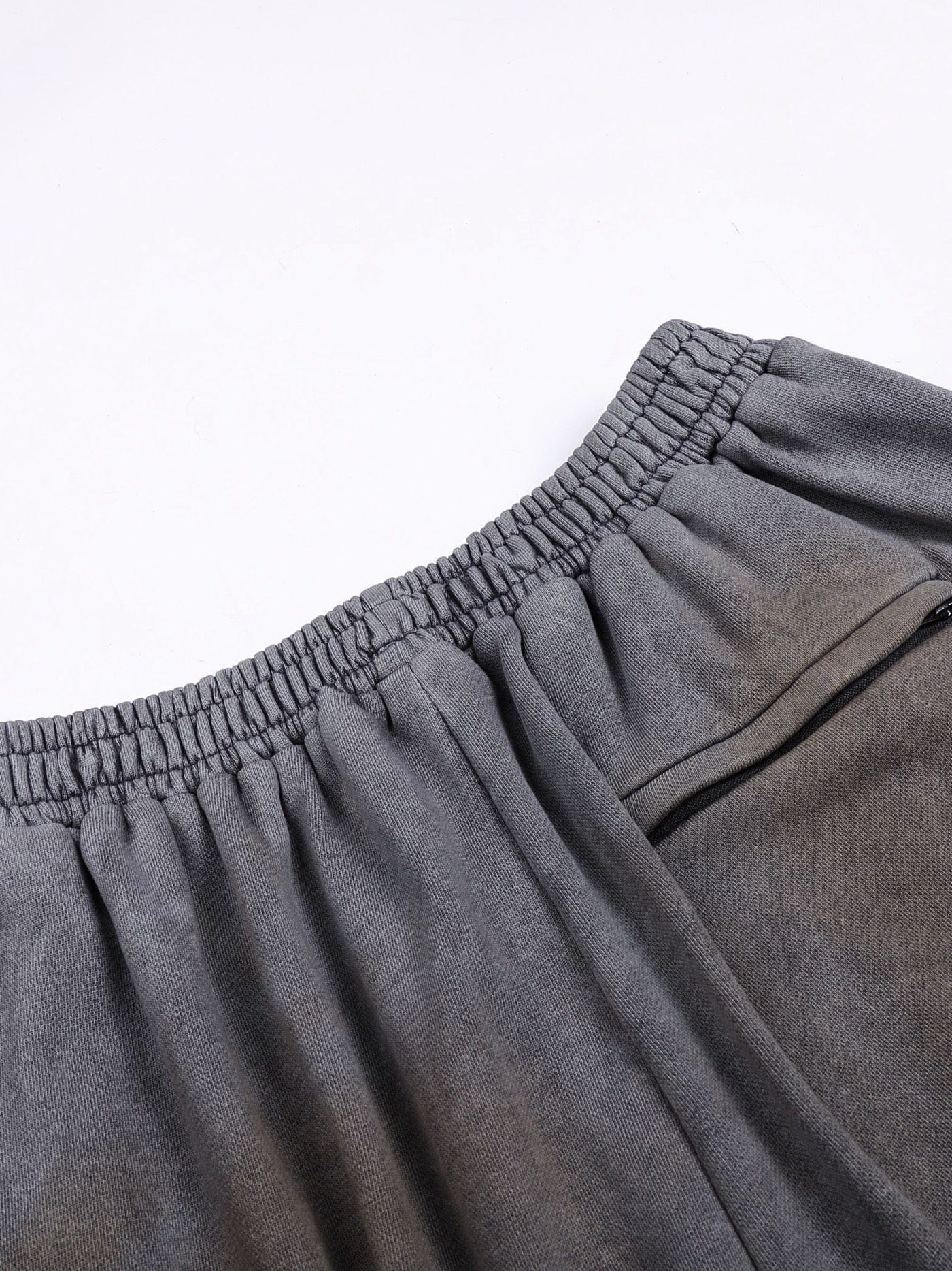 Pantalones de chándal de las piernas abiertas angustiadas