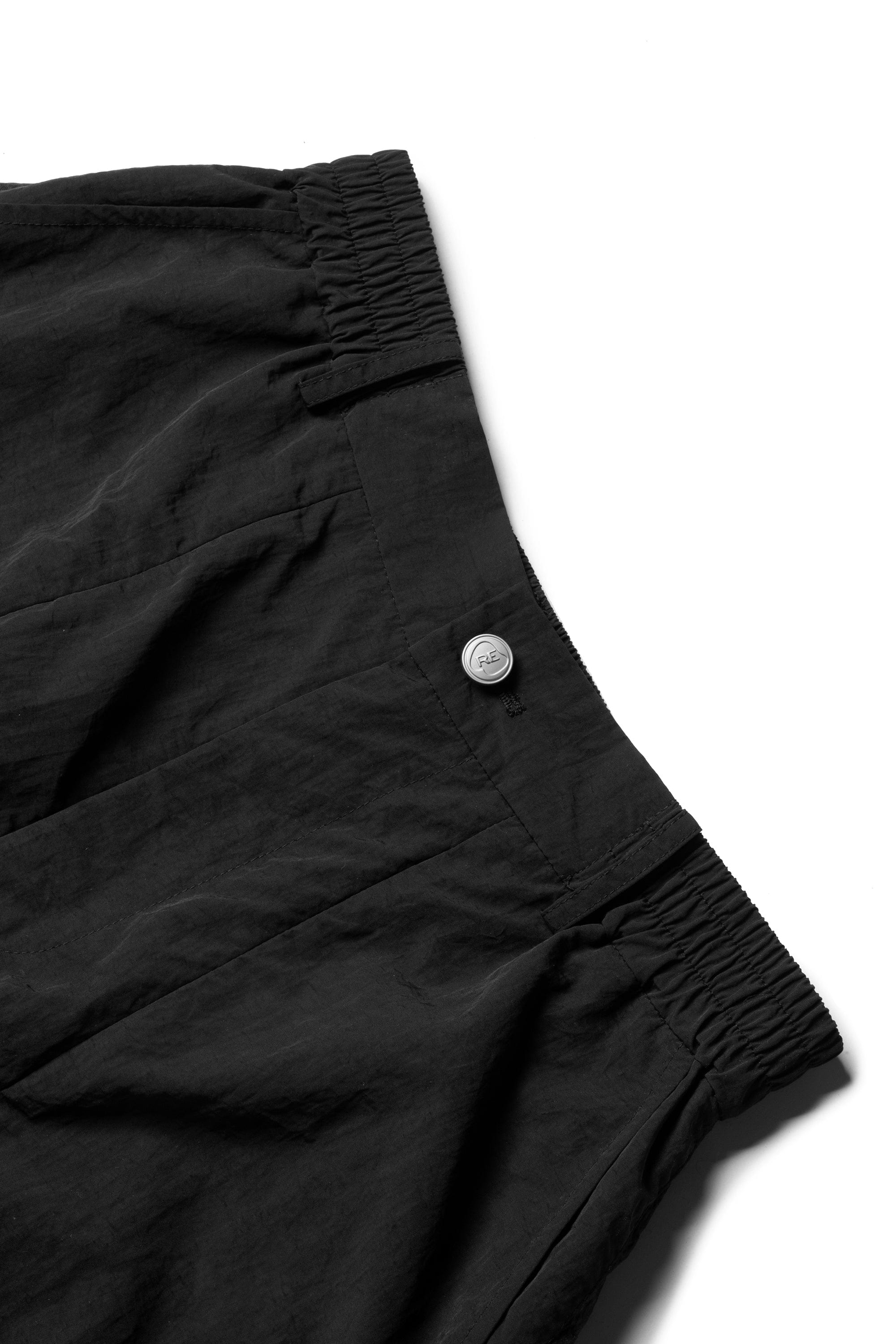 Pantalones técnicos de pierna ancha negra