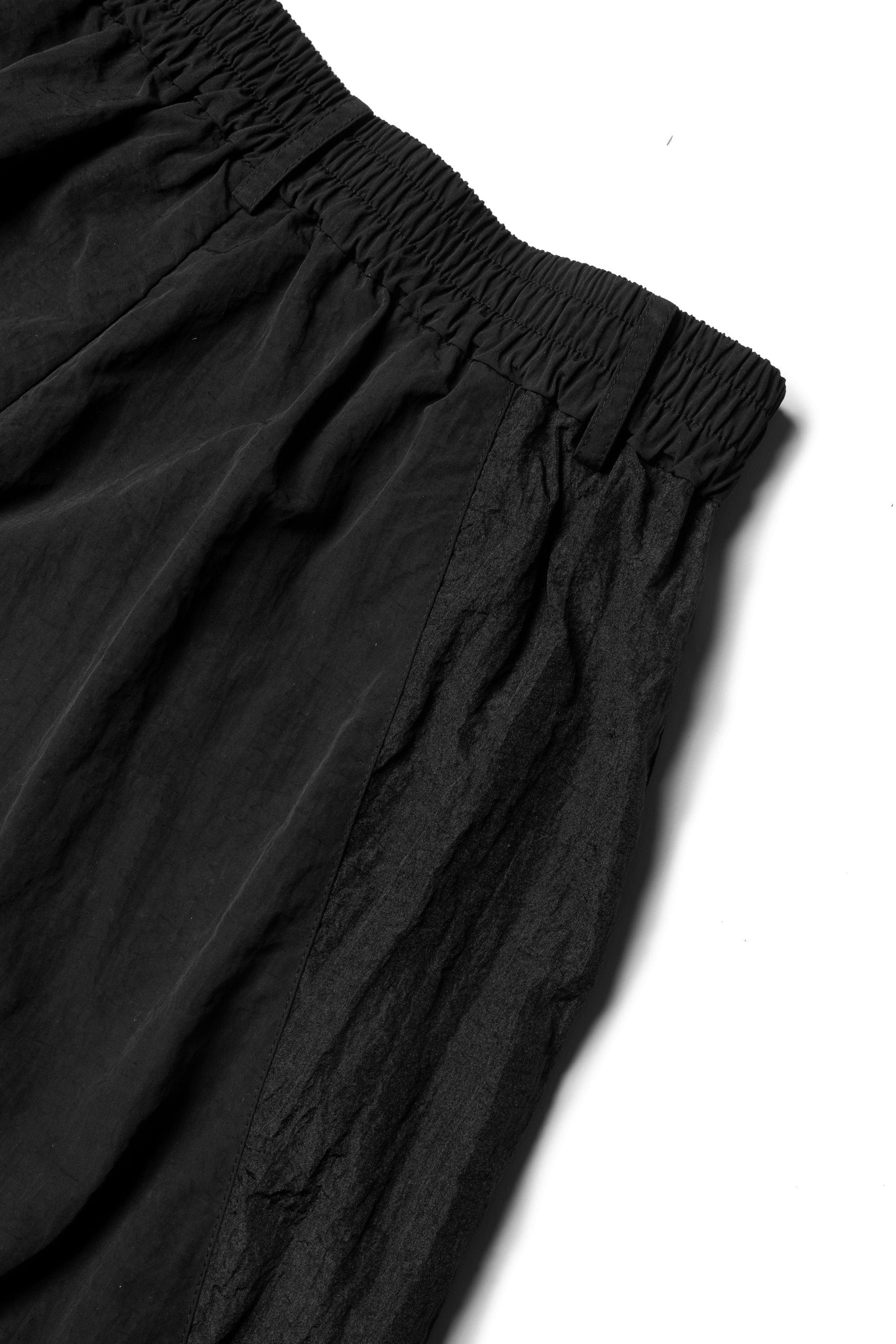 Pantalones técnicos de pierna ancha negra
