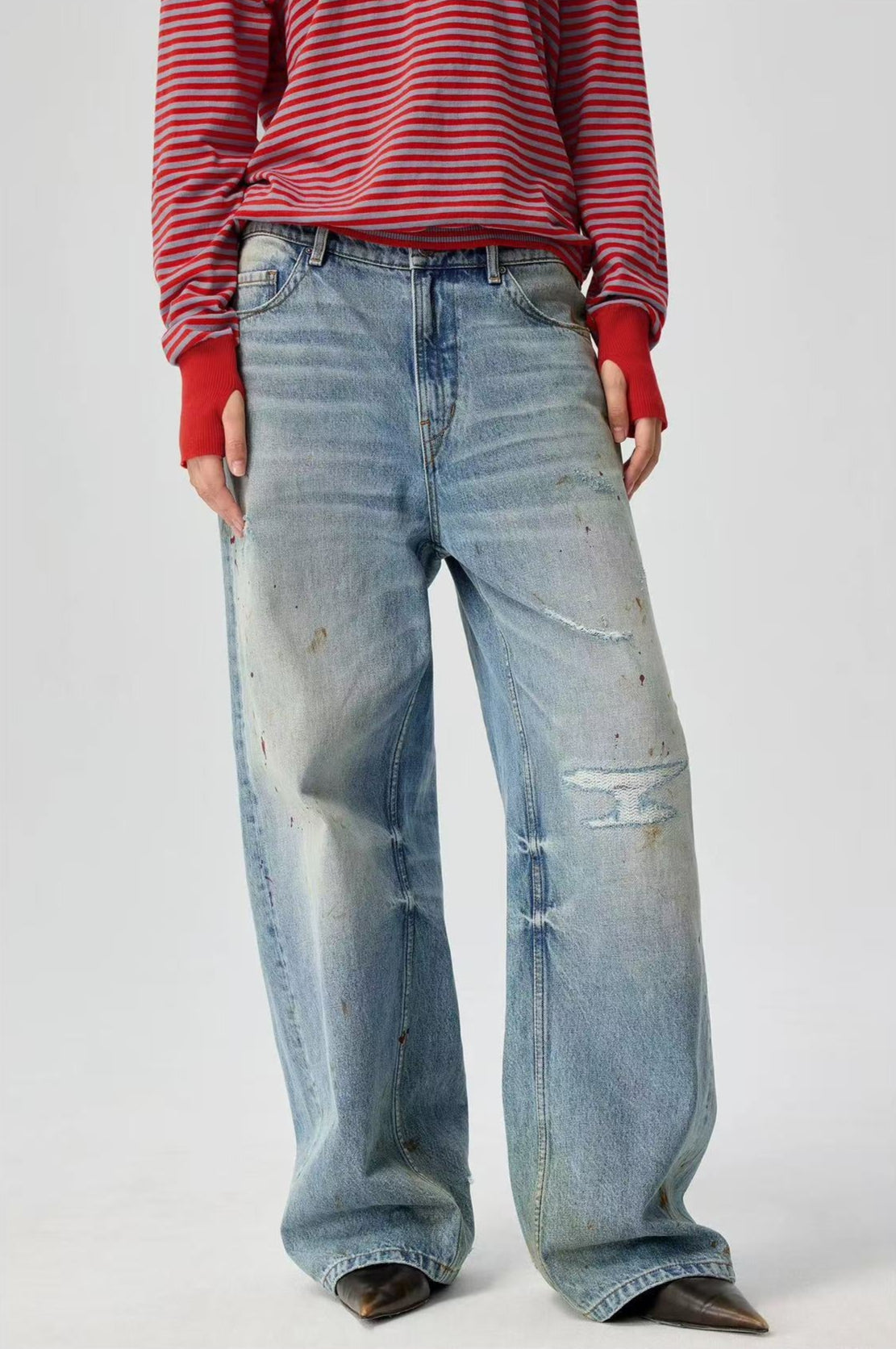 Splatter Distressed Twisted-Seam Jeans
