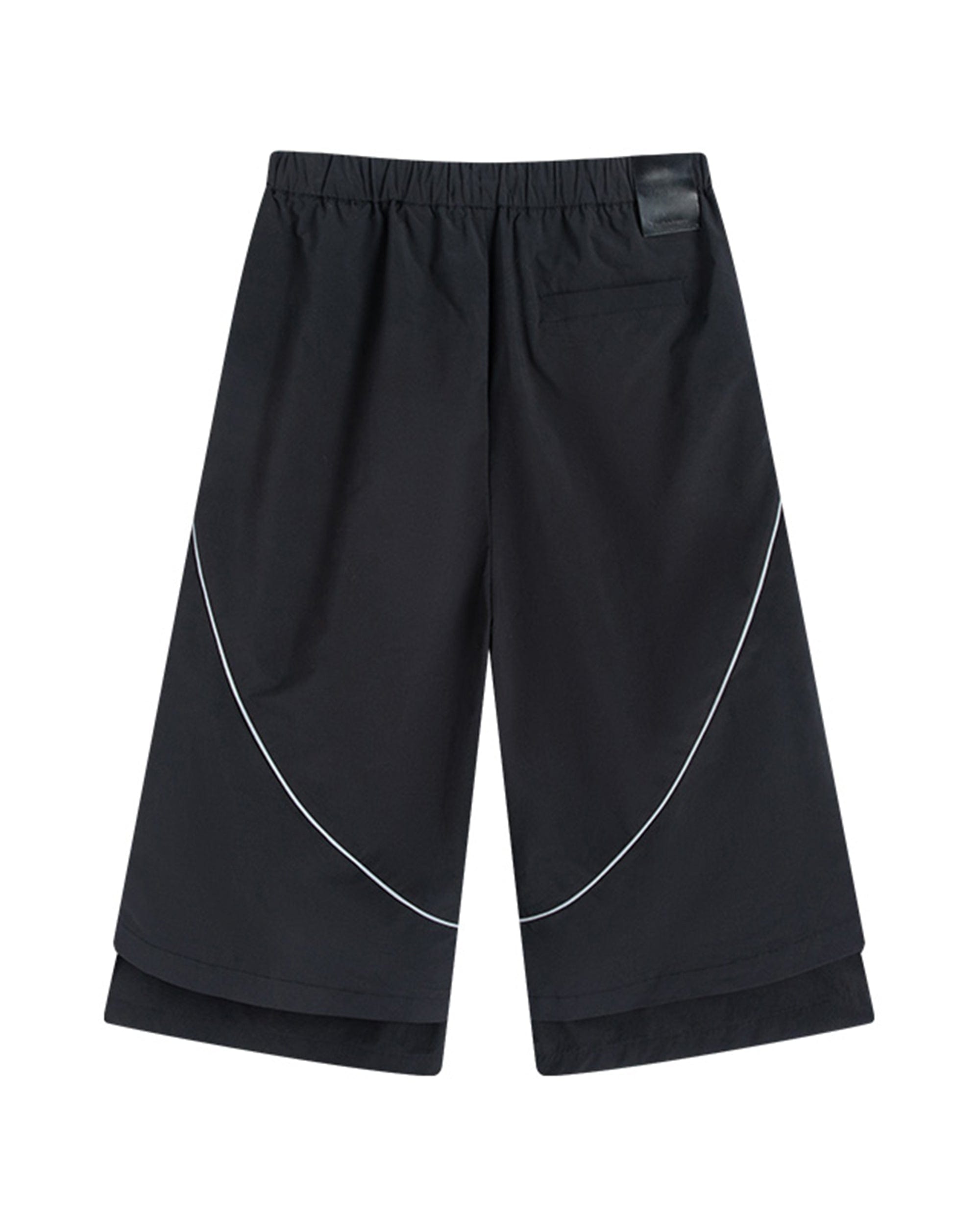 Pantalon de piste en couches larges