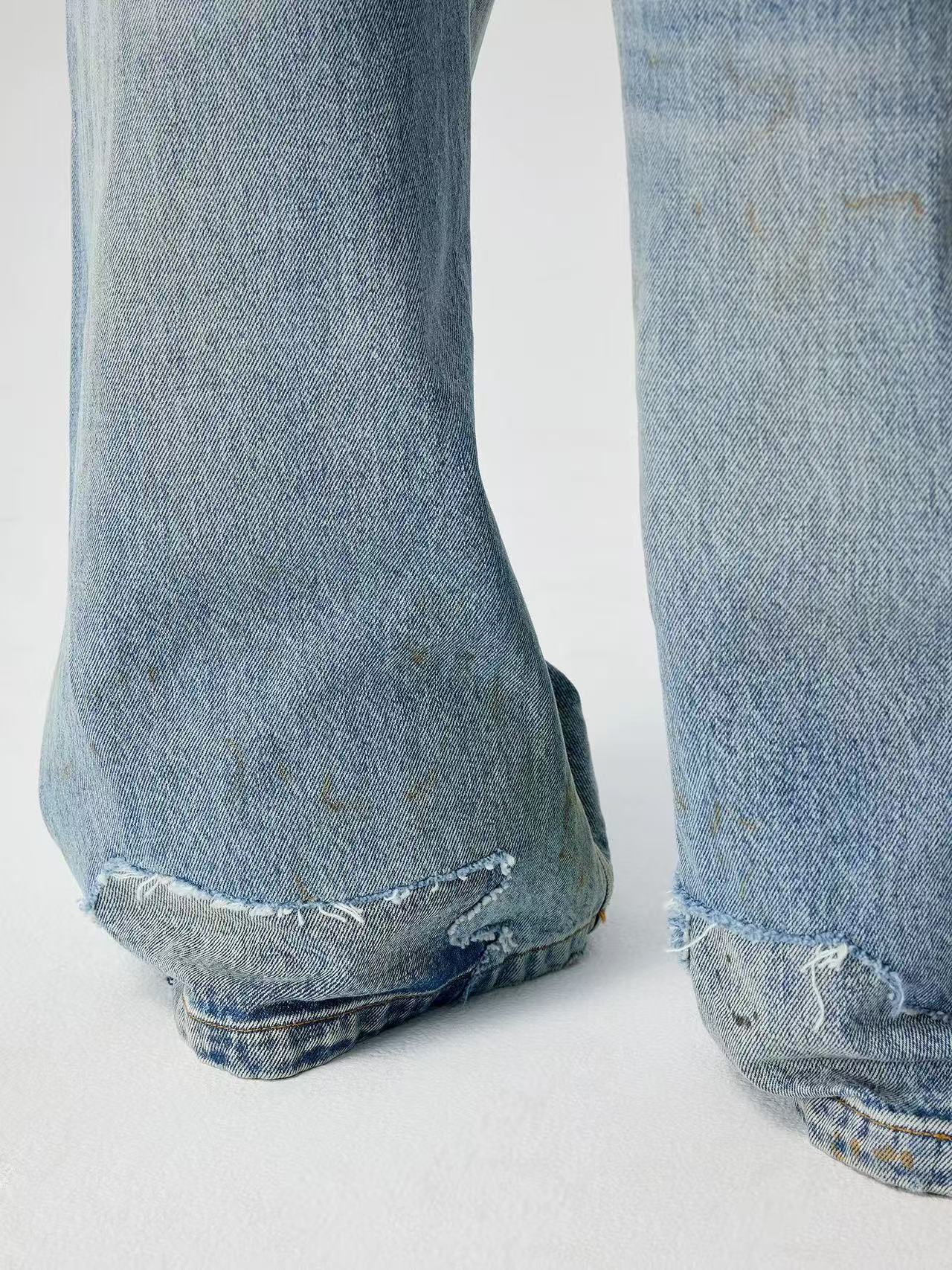 Splatter Distressed Twisted-Seam Jeans