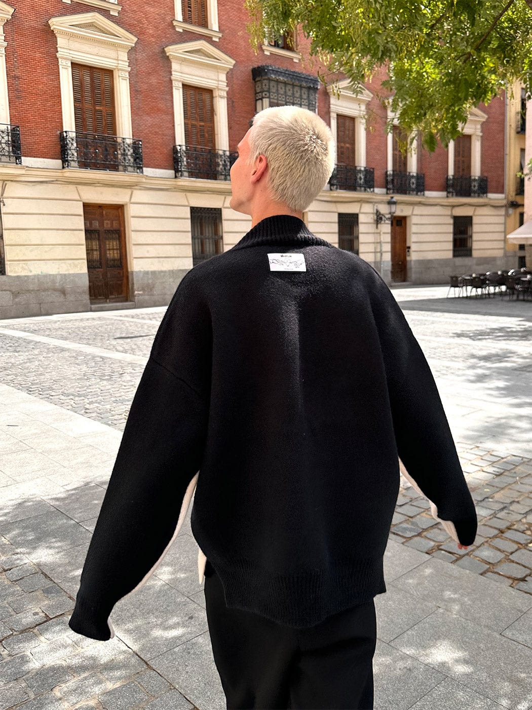 Pull à rayures de course en V