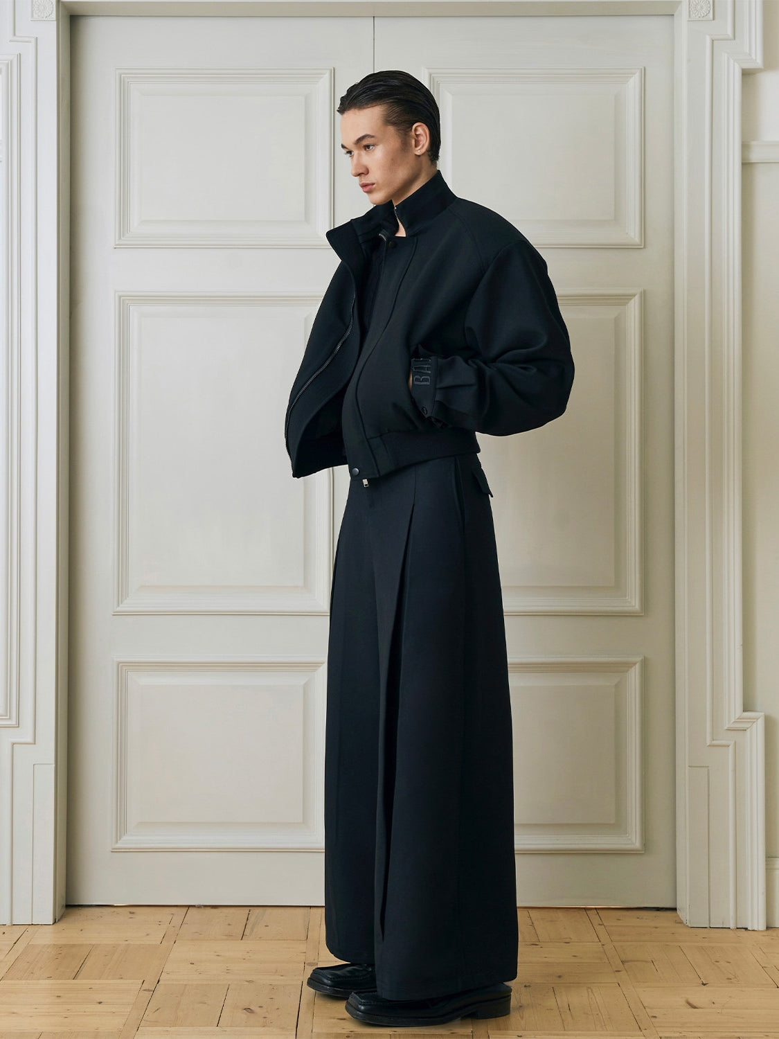 Deconstructed Black Wide-Leg Pleated Trousers