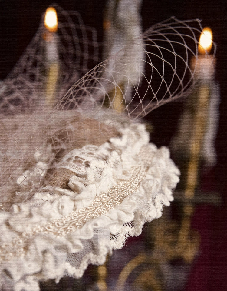 Victorian Ivory Bonnet with Floral Embellishments