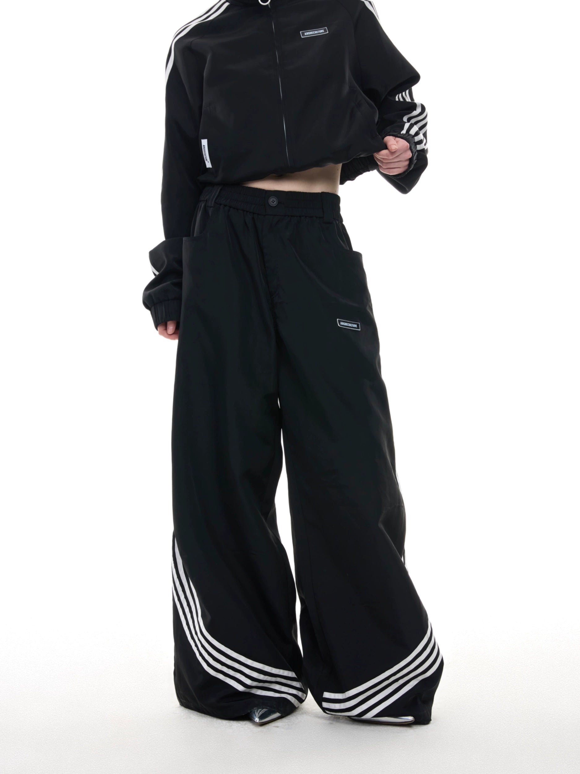 Black Track Jumpsuit with White Stripe Detail