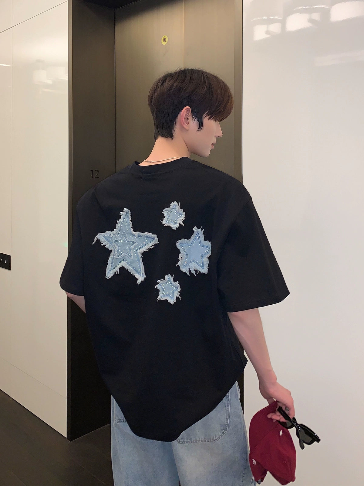 T-Shirt with Star Patches on the Back