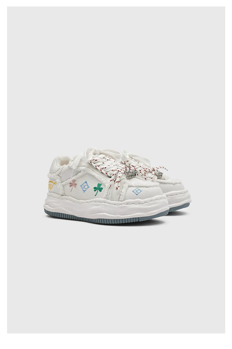 Distressed Embroidered Platform Sneakers