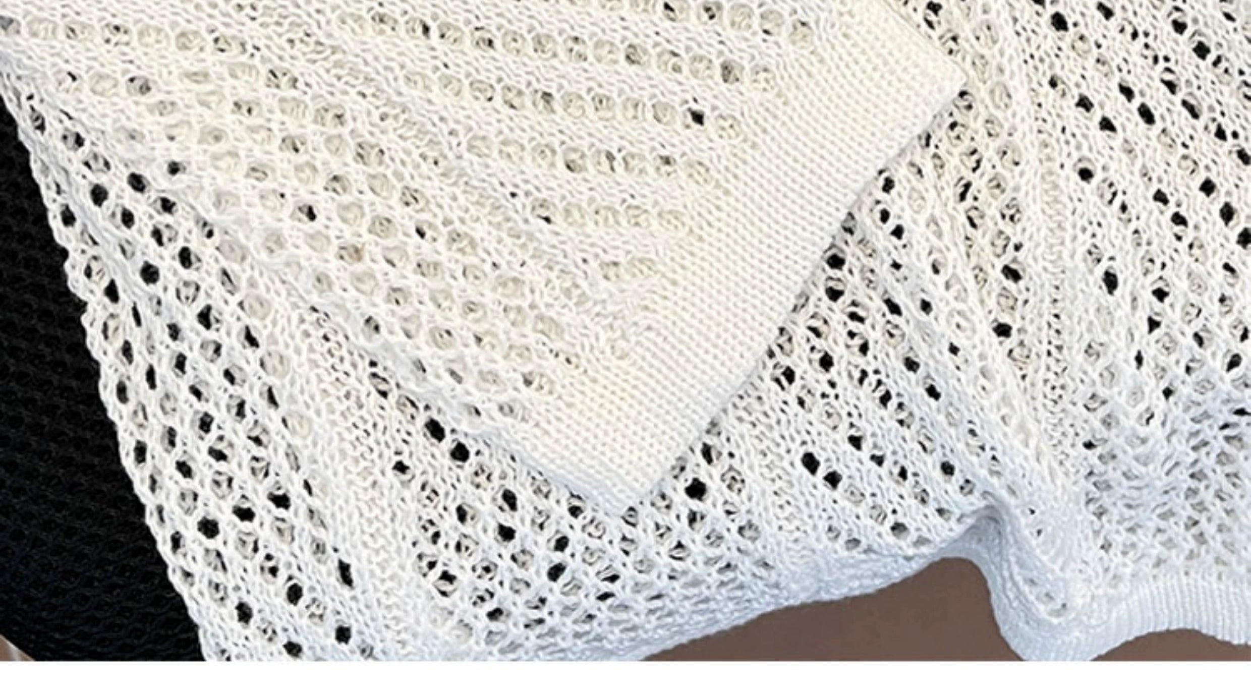 Oversized mesh knit sweater with a drawstring neckline
