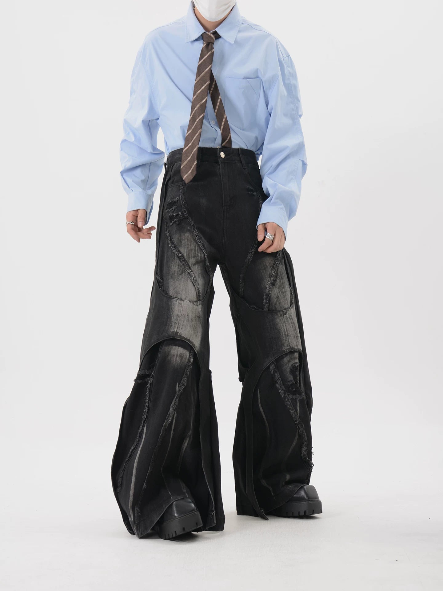 Obsidian Rift Shredded Wave Denim Trousers