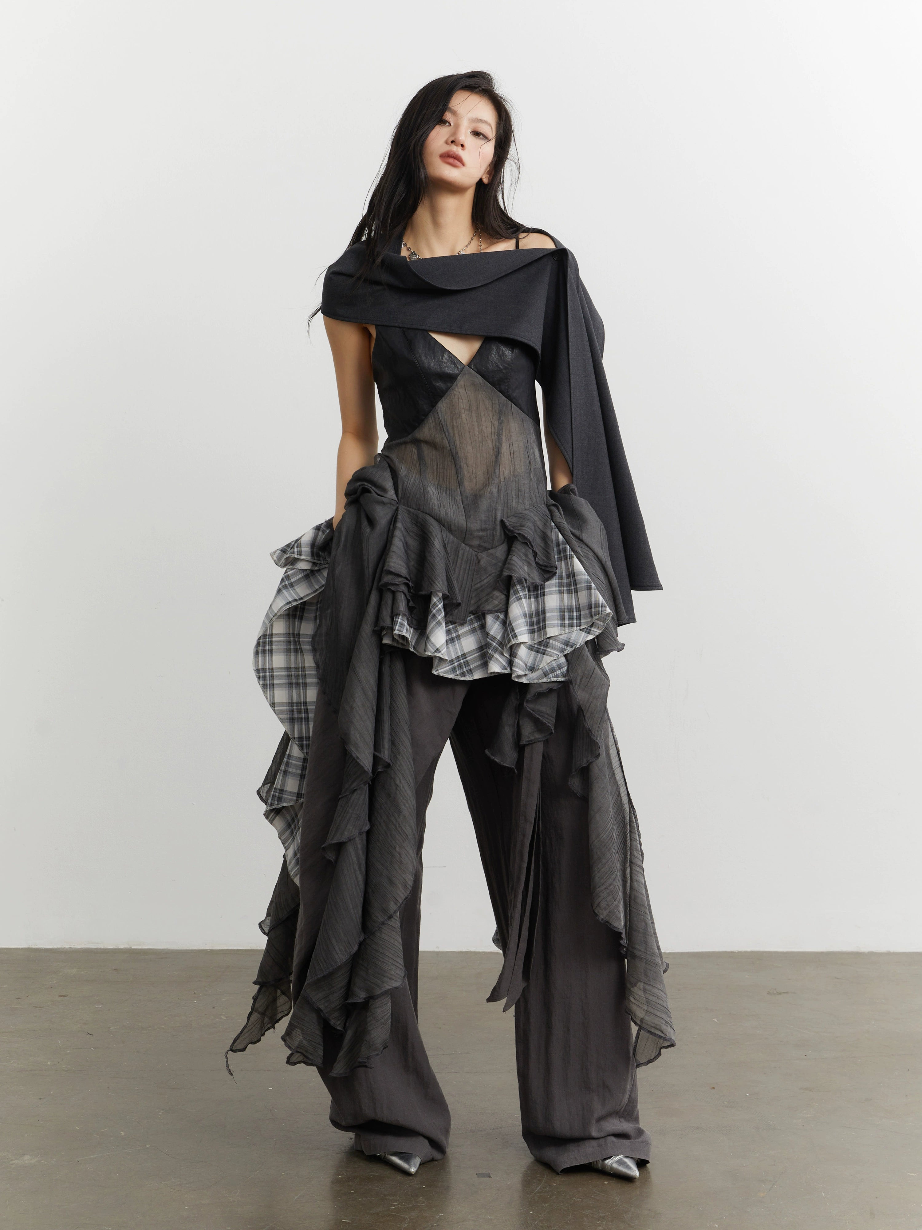Noir Plaid Ruffle Cascade Dress by JNYLON STUDIOS | Chiclara