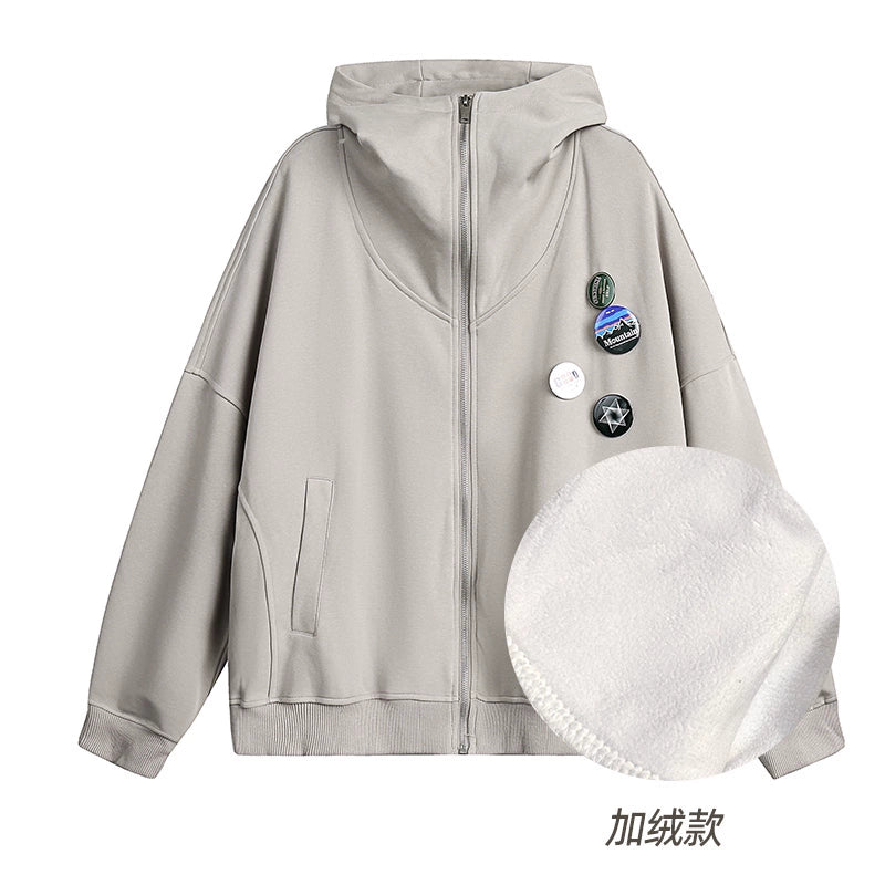 Manteau gris à capuche zippé