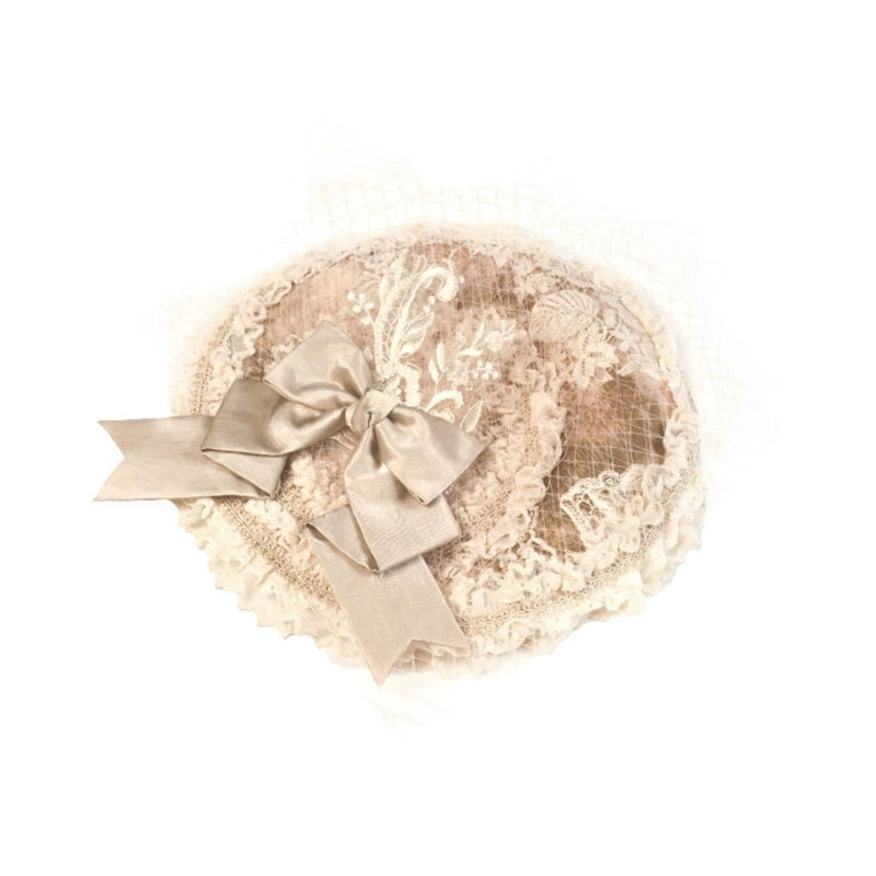 Victorian Ivory Bonnet with Floral Embellishments