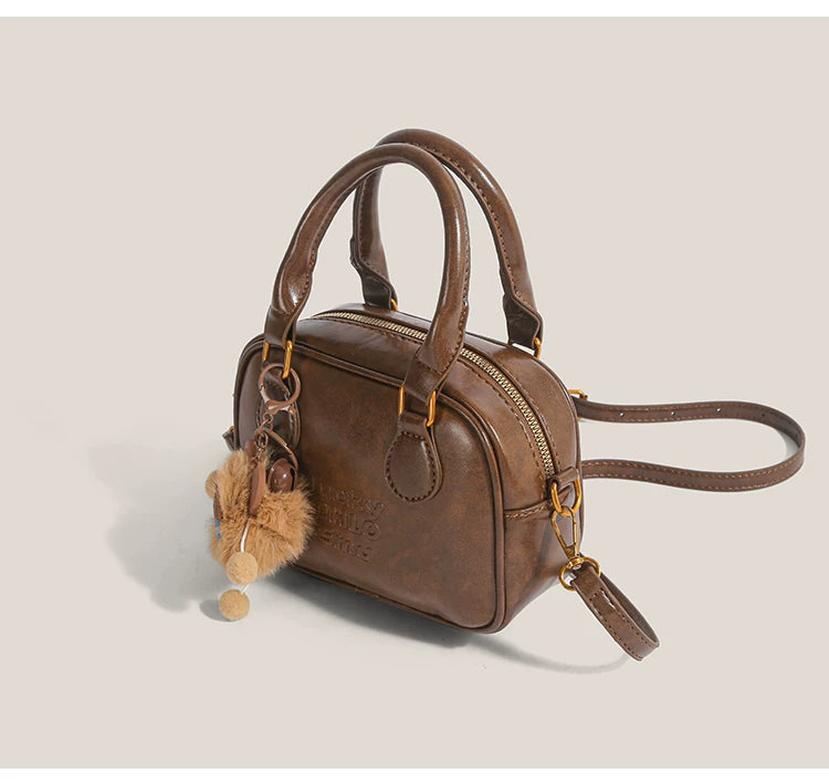 Cocoa Cub Charm Satchel