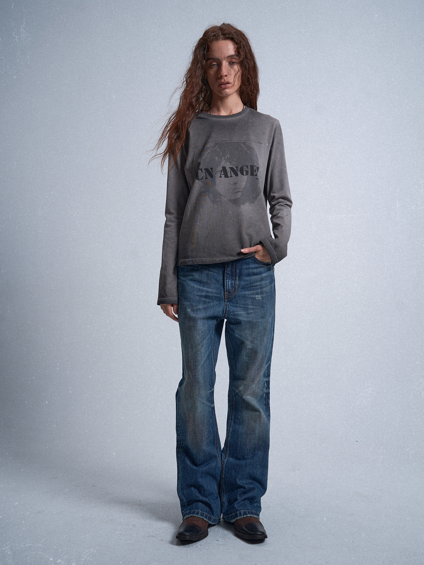 Rust‑Dyed Navy Distressed Bootcut Jeans