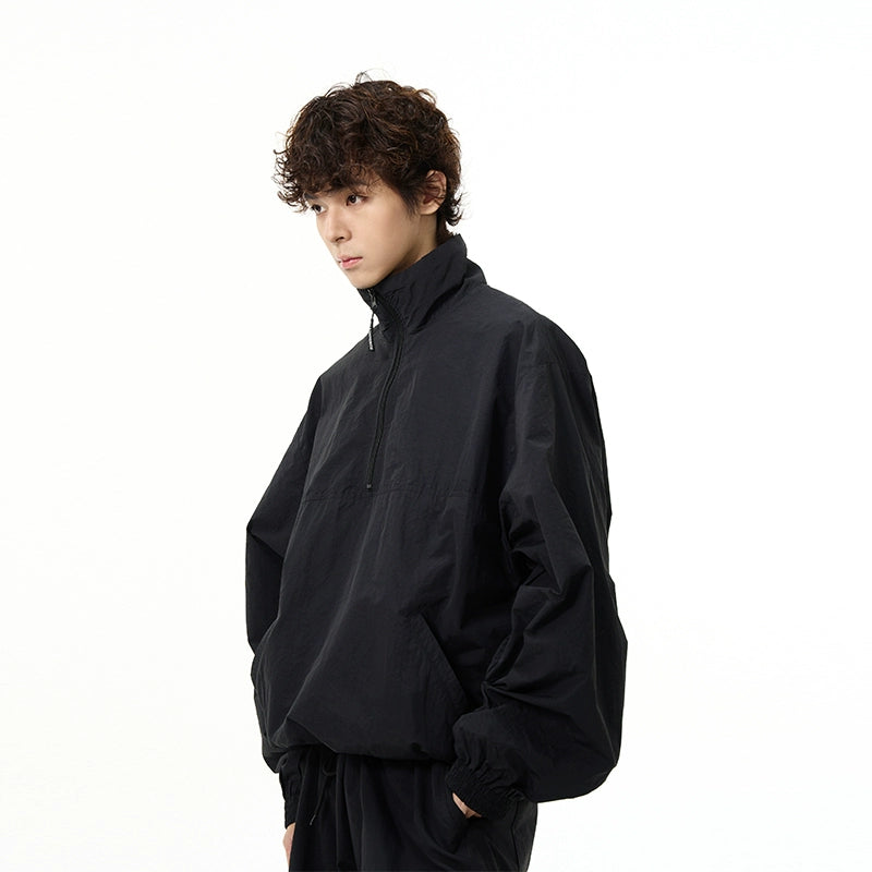 All-Black Oversized Windbreaker and Cargo Pants Setup