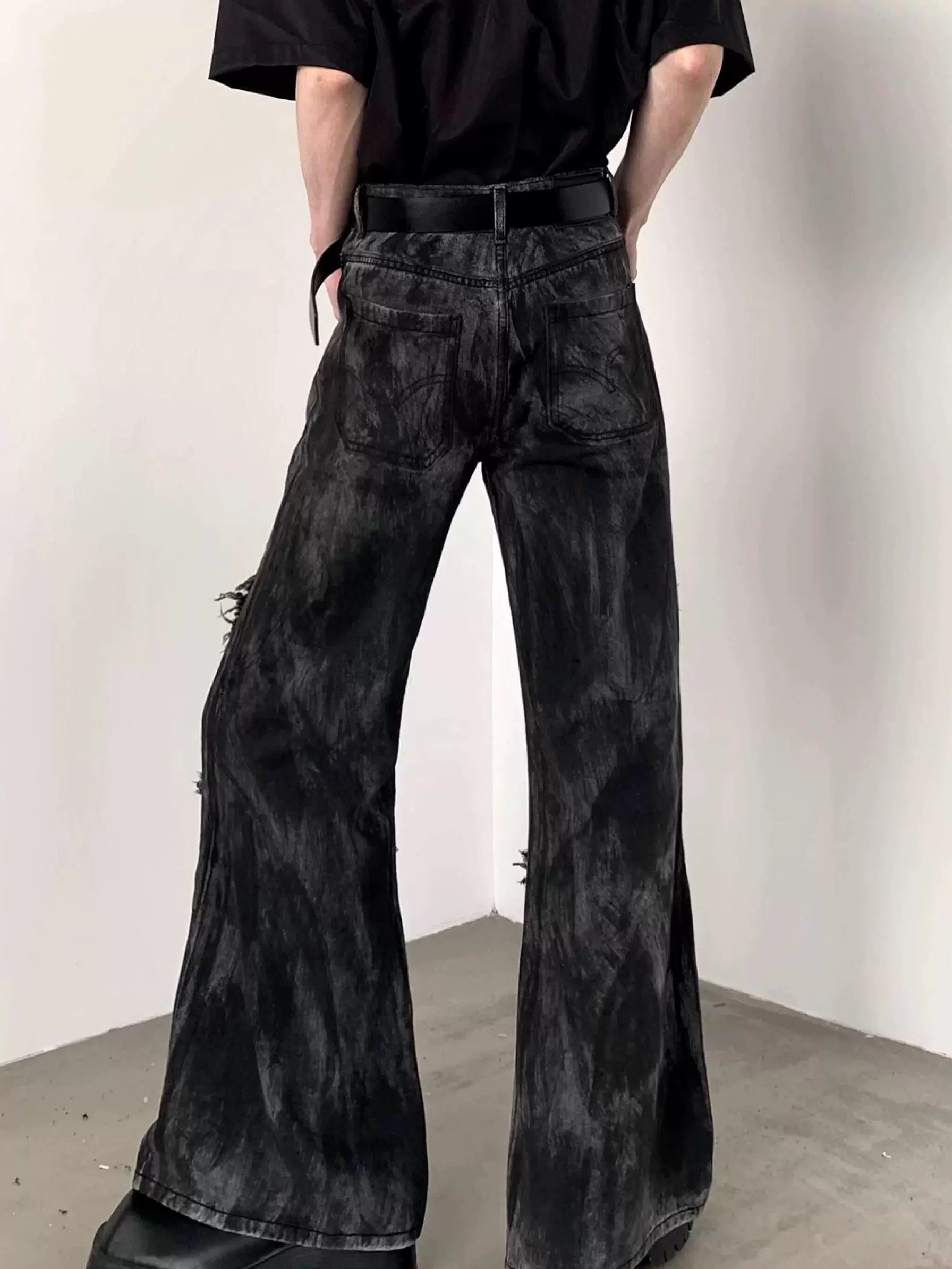 Black Distressed Flared Jeans with Frayed Seams