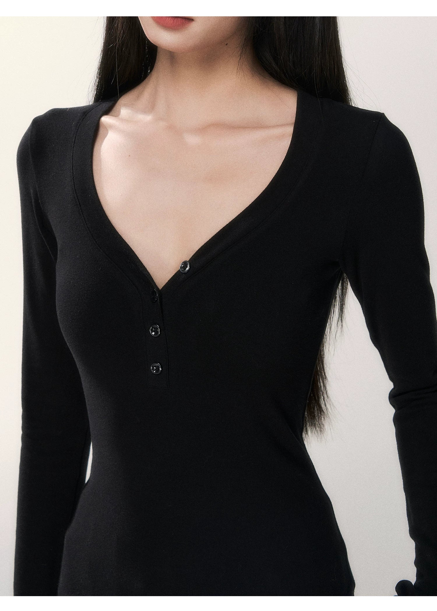 Noir Silhouette Buttoned V‑Neck Top