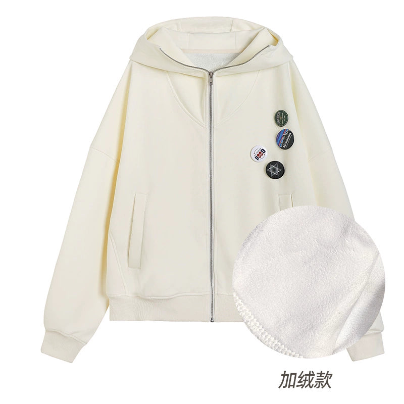 Manteau gris à capuche zippé