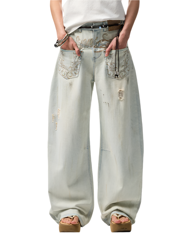 Distressed Arc-Leg Jeans