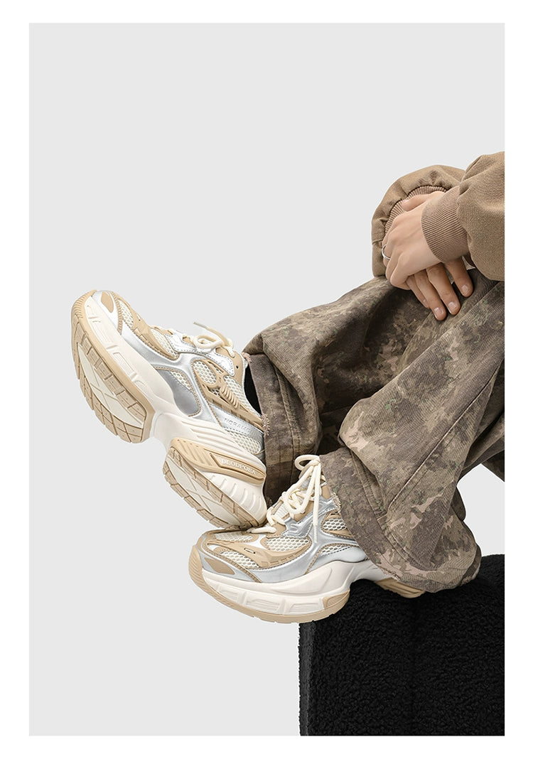 Chunky Futuristic Sneakers with Mesh Panels and Crisscross Detailing