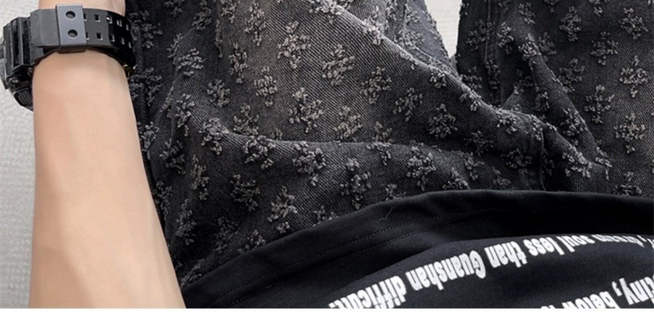 Distressed Wash Denim Shorts with Embroidered Floral Pattern