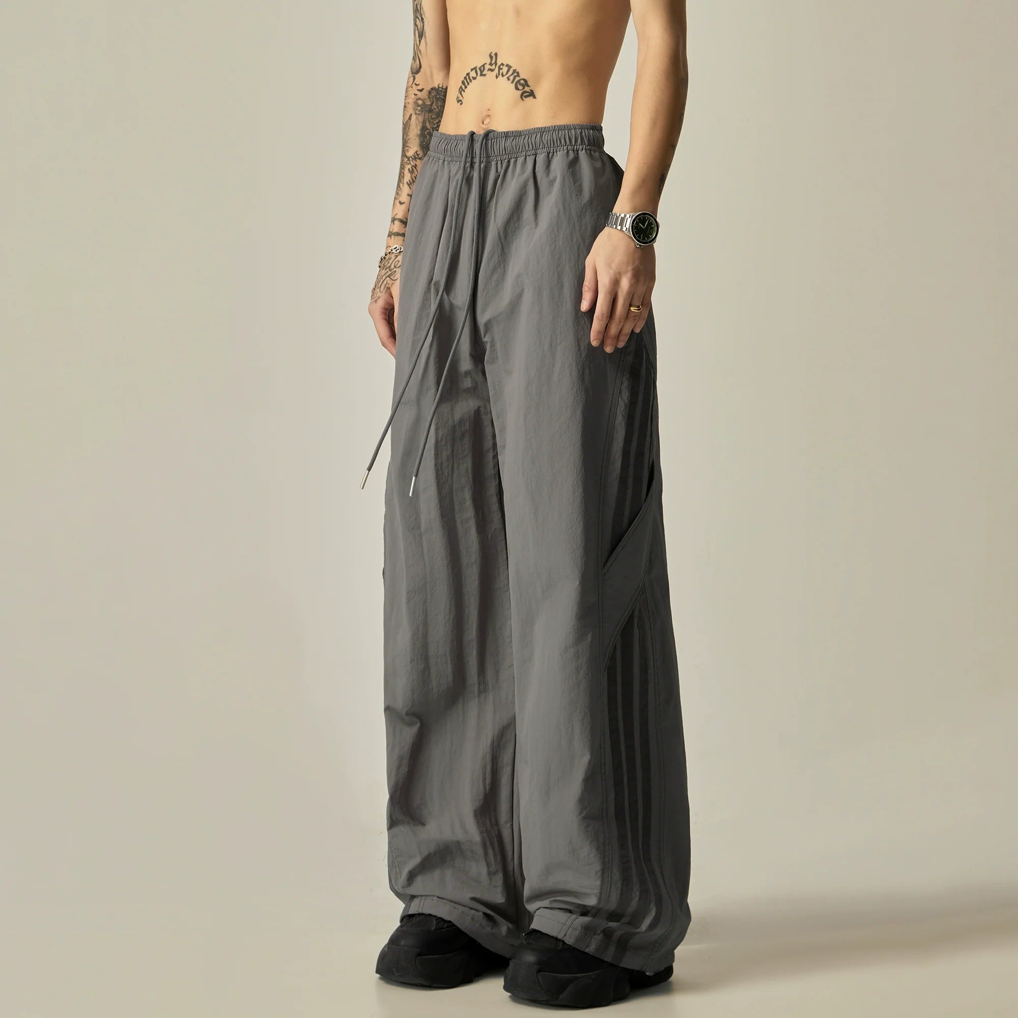 Pantalones de rayas atléticas de pierna ancha