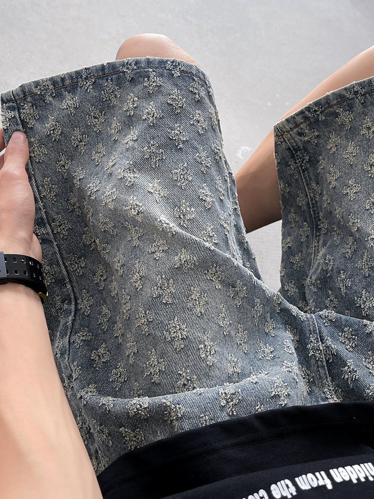 Distressed Wash Denim Shorts with Embroidered Floral Pattern