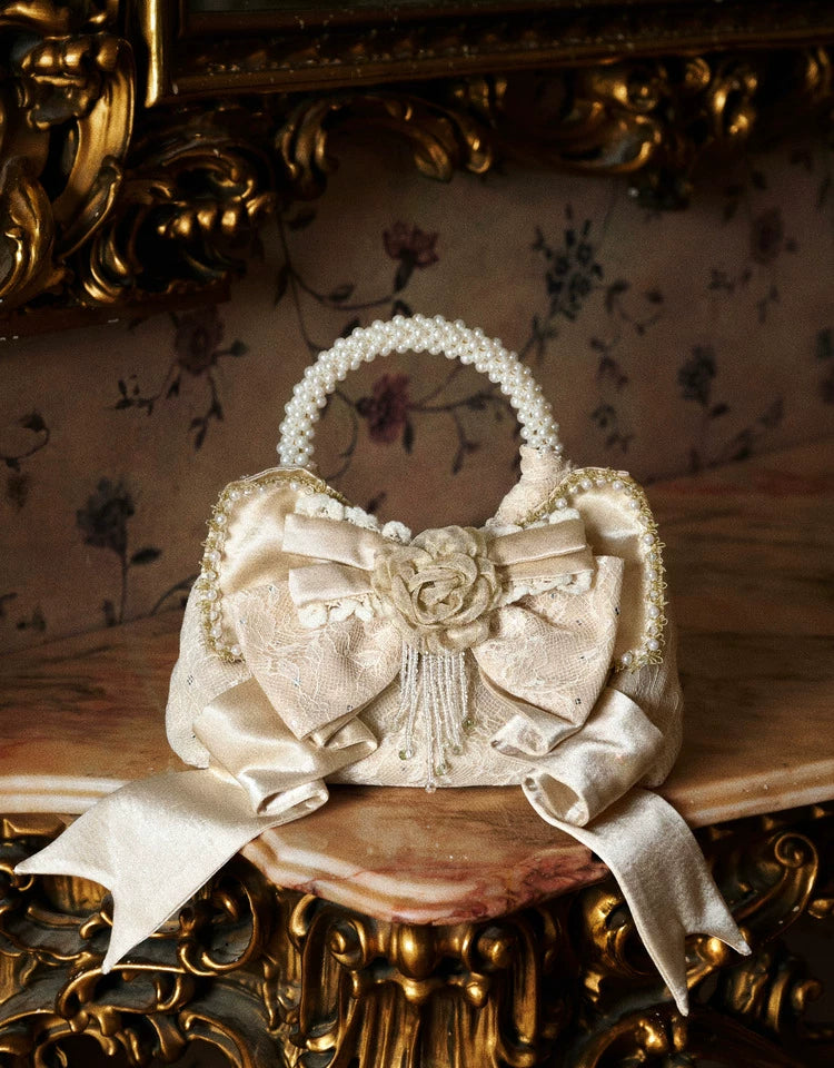 Pearl Handle Rosette Bow Mini Bag