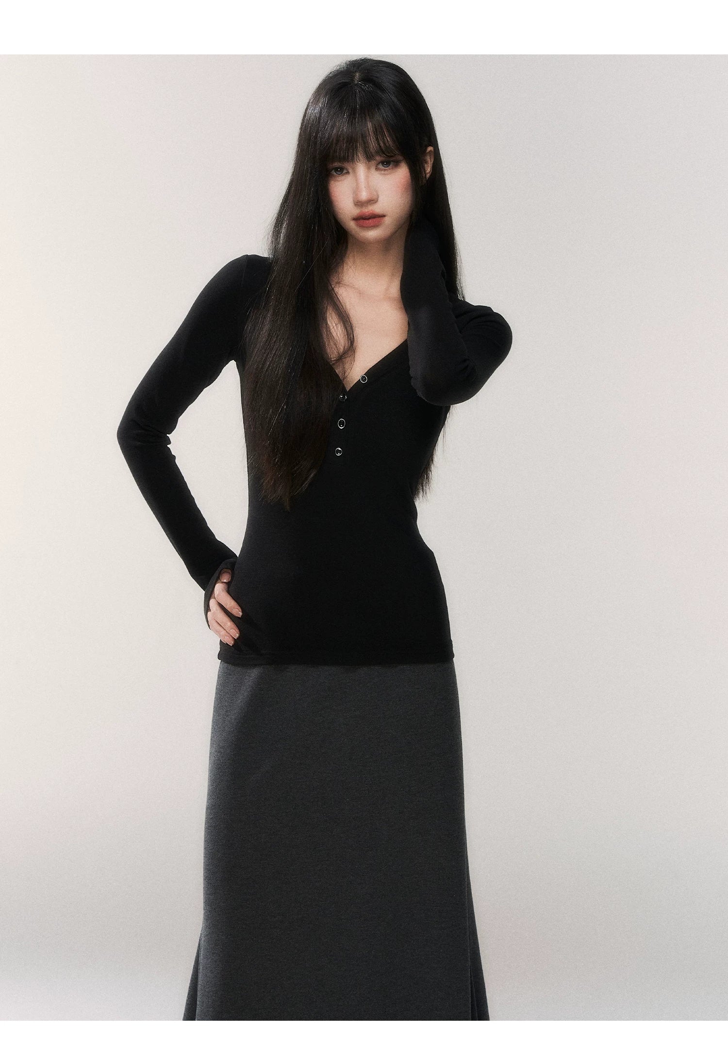 Noir Silhouette Buttoned V‑Neck Top