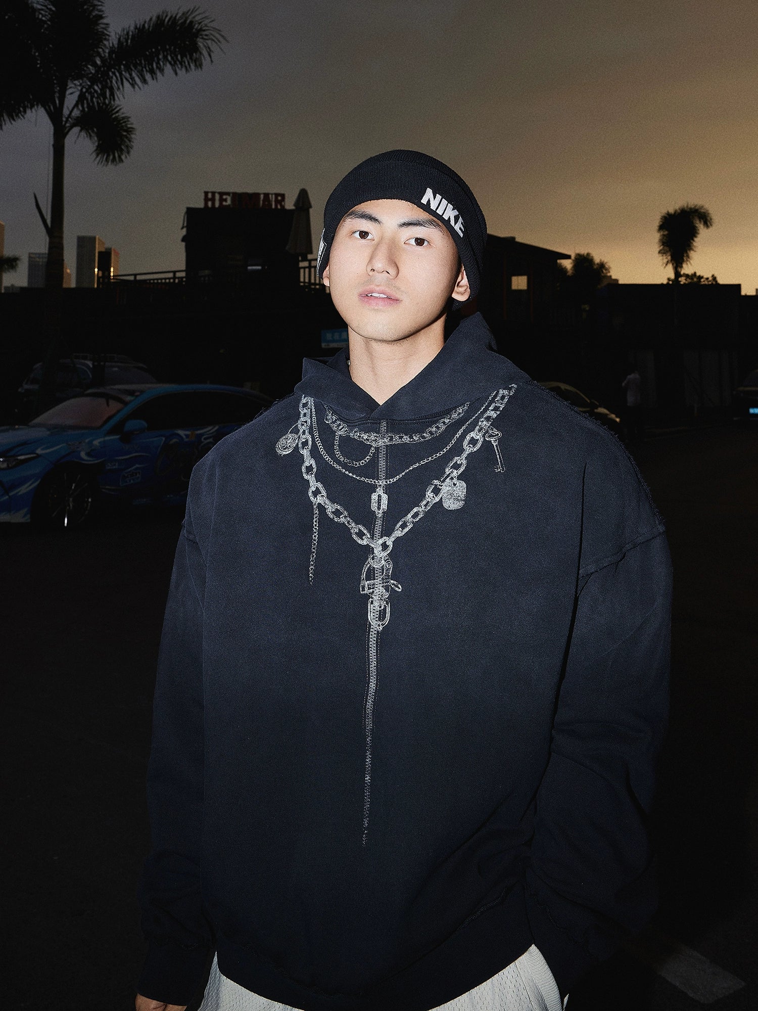 Oversized Faded Hoodie with Chain Print