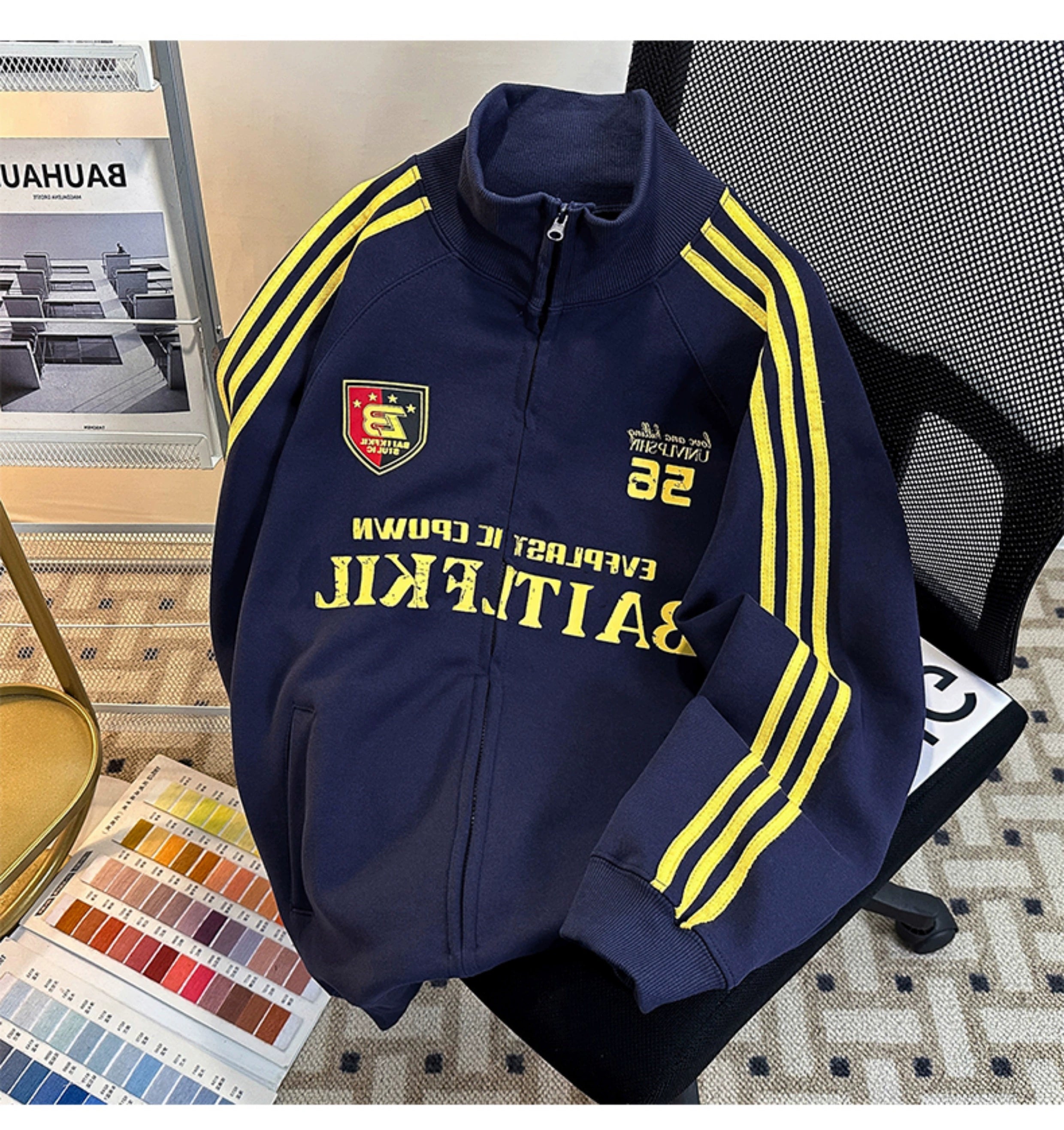 Black Track Jacket with Red Stripes and White Graphic Lettering