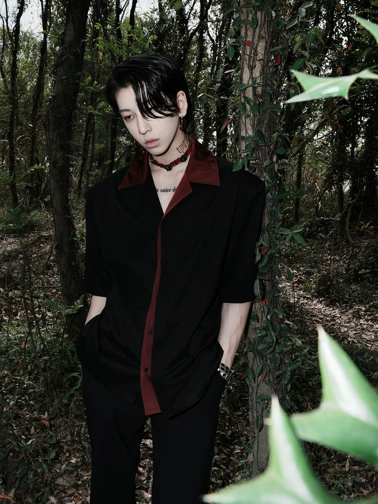 Black Short-Sleeve Button-Up Shirt with Burgundy Collar and Placket