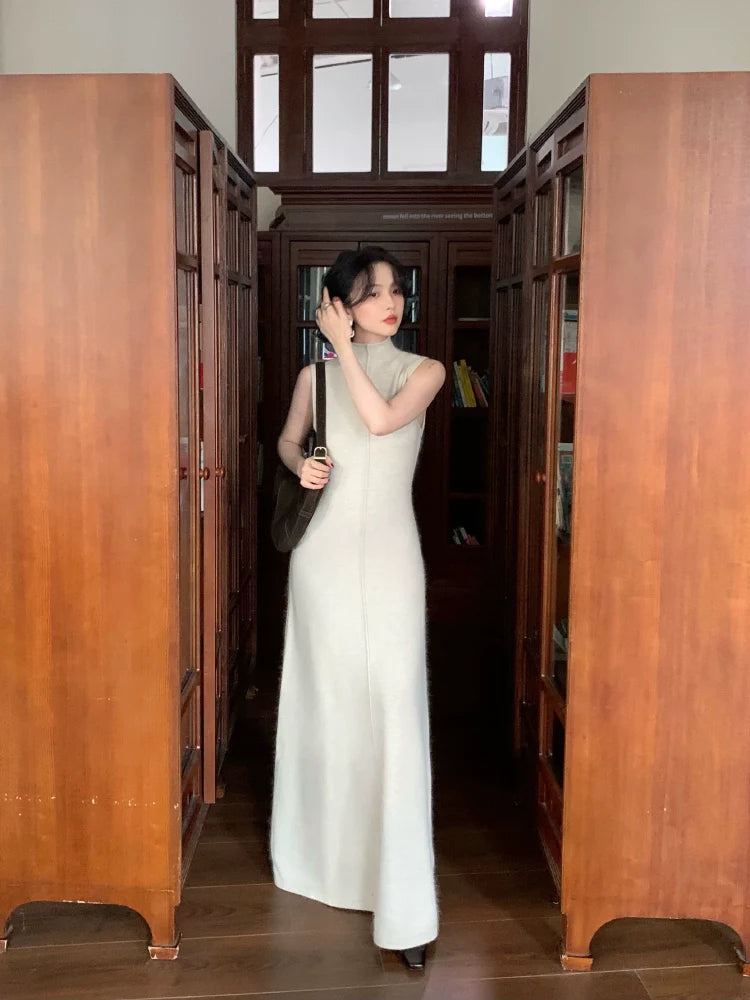 Raccoon Sleeveless Mock Neck Maxi Dress