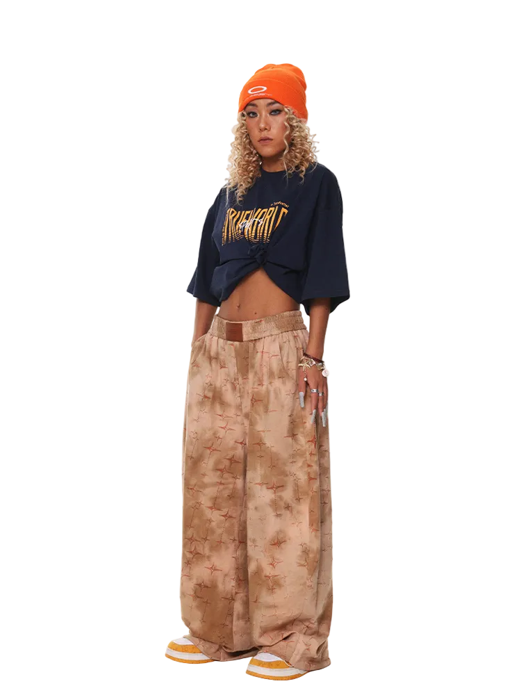 Star‑Etched Desert Satin Trousers