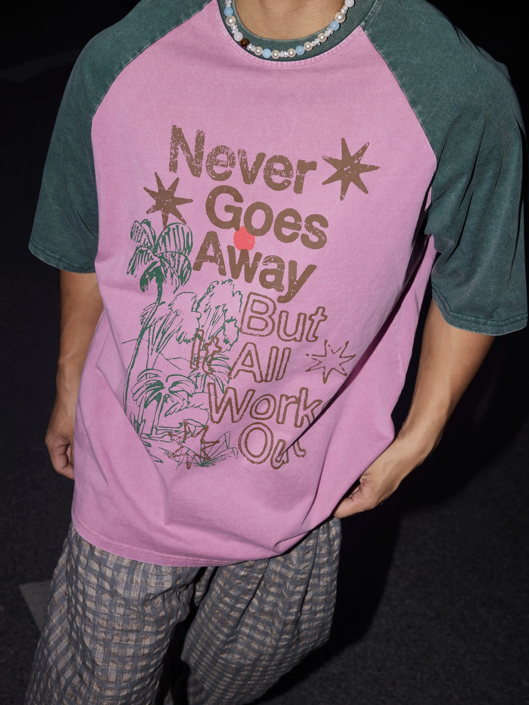 Never Goes Away Graphic Tee