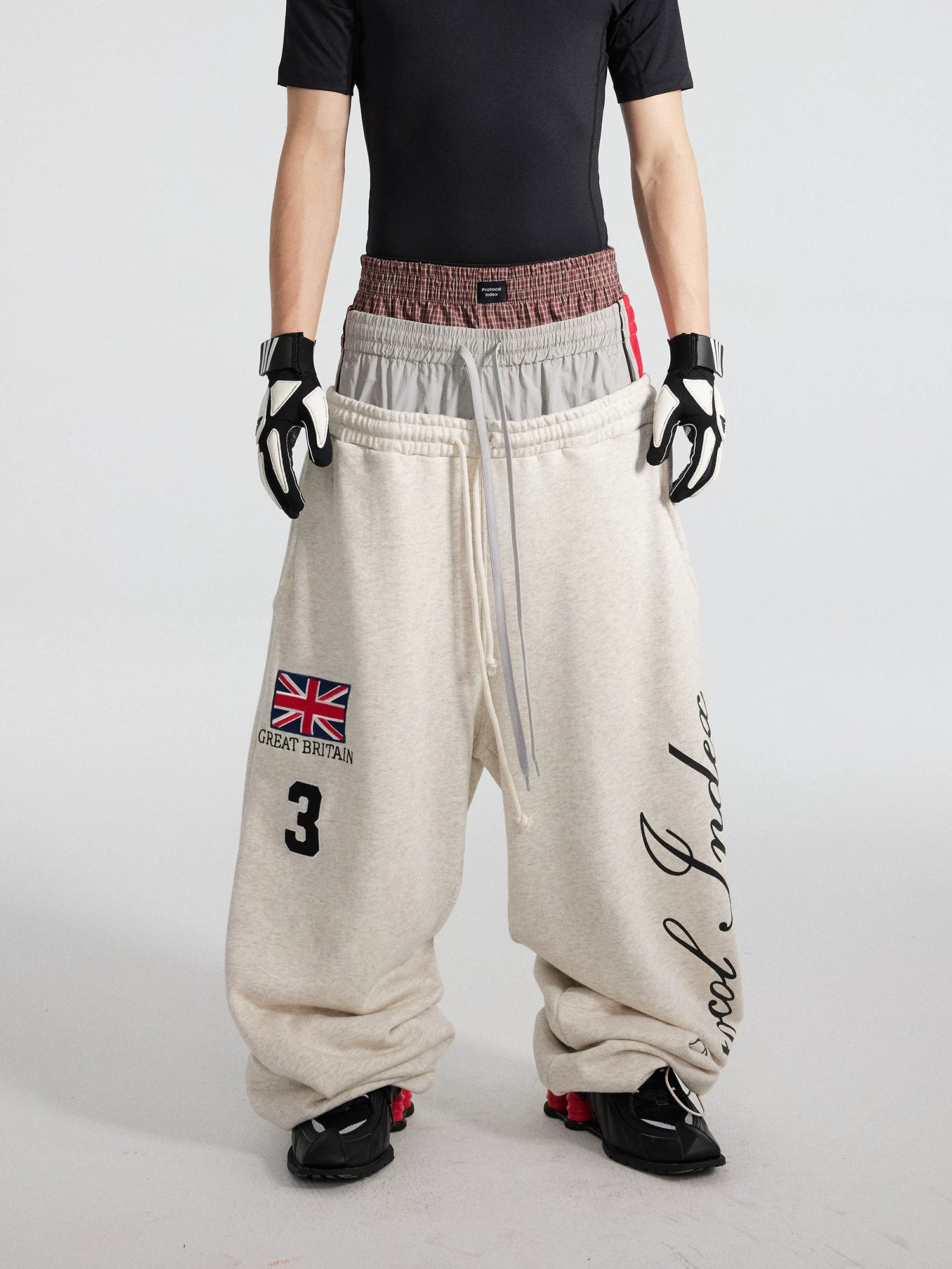 Union Stack Triple-Waist Track Flares
