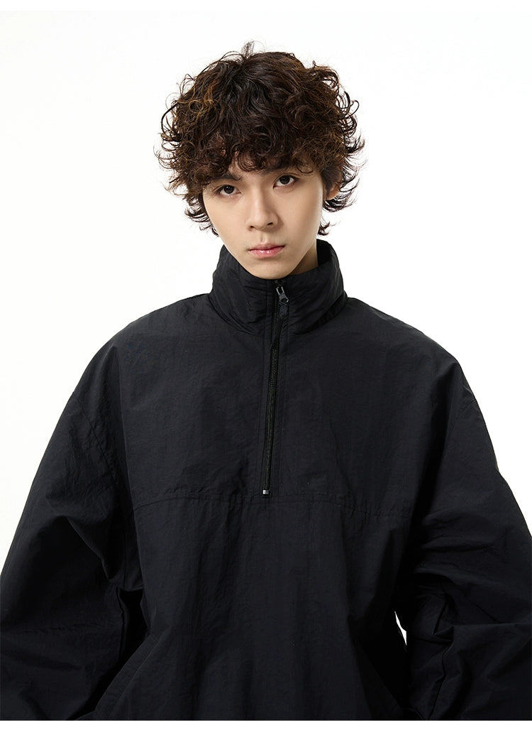 All-Black Oversized Windbreaker and Cargo Pants Setup