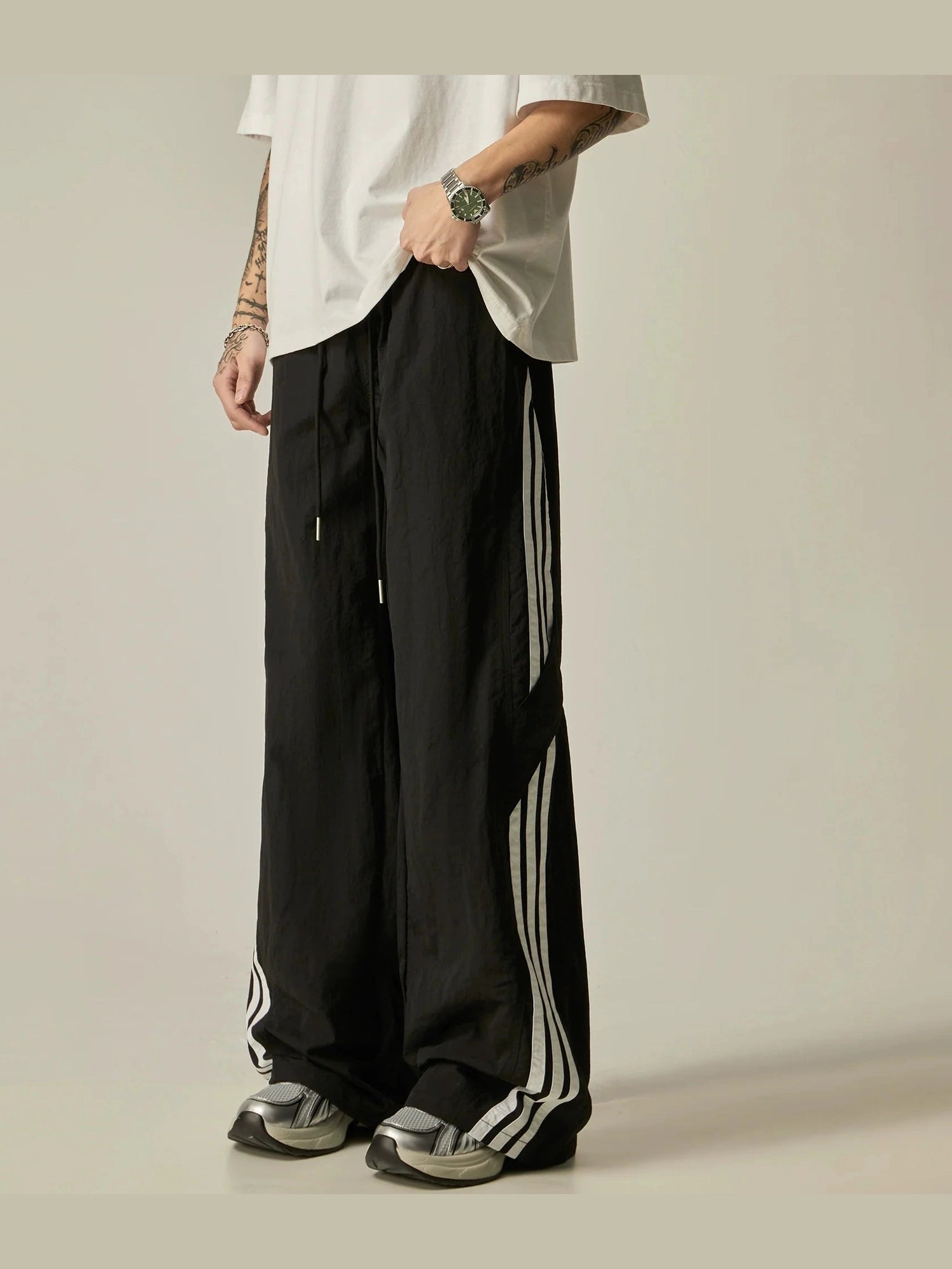Pantalones de rayas atléticas de pierna ancha
