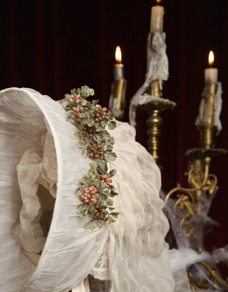 Victorian Ivory Bonnet with Floral Embellishments